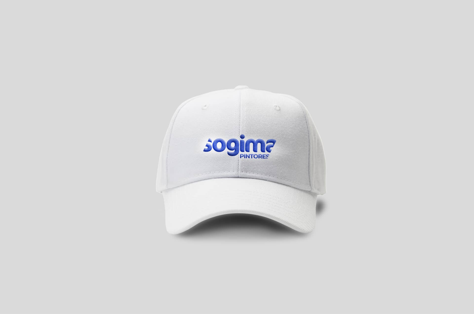Gorra blanca de trabajo Sogima branding por The Acctitude diseño web